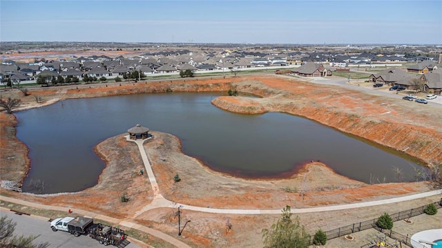8301 NW 146th St, Oklahoma City, OK 73142 - drone / aerial view featuring a residential view and a water view
