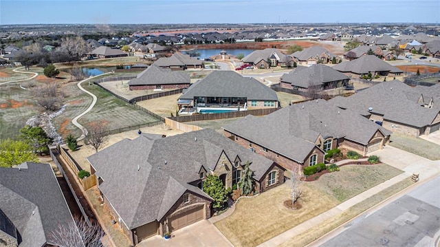 8301 NW 146th St, Oklahoma City, OK 73142 - birds eye view of property with a residential view and a water view
