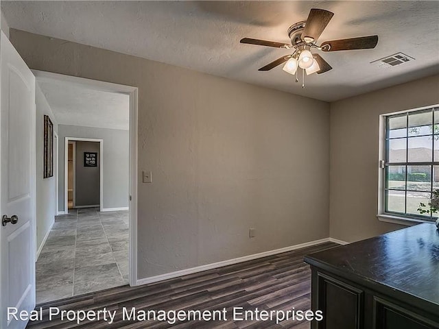 2325 NW 119th St, Oklahoma City, OK 73120 - interior space with a textured ceiling, visible vents, ceiling fan, and baseboards