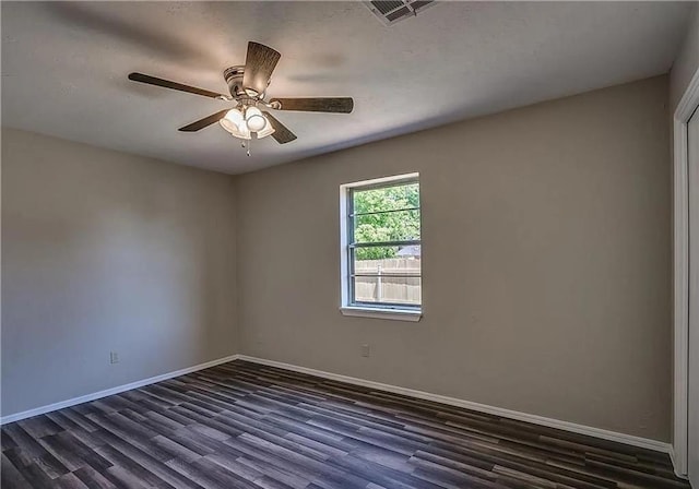 2325 NW 119th St, Oklahoma City, OK 73120 - empty room with baseboards, visible vents, dark wood-type flooring, and a ceiling fan