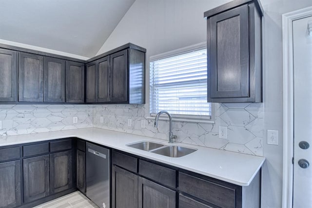 13412 Arrowhead Blvd, Yukon, OK 73099 - kitchen with vaulted ceiling, decorative backsplash, stainless steel dishwasher, and a sink