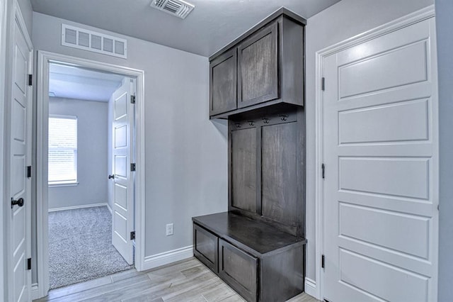 13412 Arrowhead Blvd, Yukon, OK 73099 - mudroom featuring baseboards, light wood-style floors, and visible vents