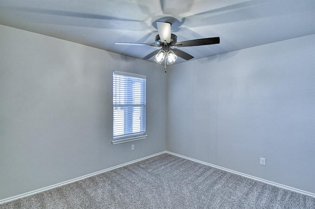 13412 Arrowhead Blvd, Yukon, OK 73099 - unfurnished room featuring a ceiling fan, baseboards, and carpet