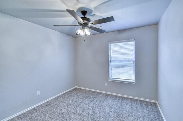 13412 Arrowhead Blvd, Yukon, OK 73099 - unfurnished room with ceiling fan, carpet floors, and baseboards