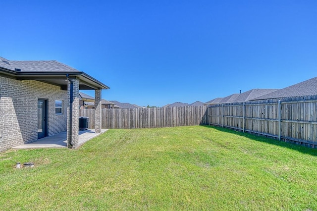 13412 Arrowhead Blvd, Yukon, OK 73099 - view of yard featuring a fenced backyard and a patio area