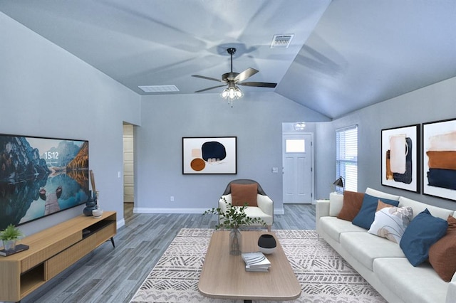 13412 Arrowhead Blvd, Yukon, OK 73099 - living room with lofted ceiling, ceiling fan, visible vents, and wood finished floors