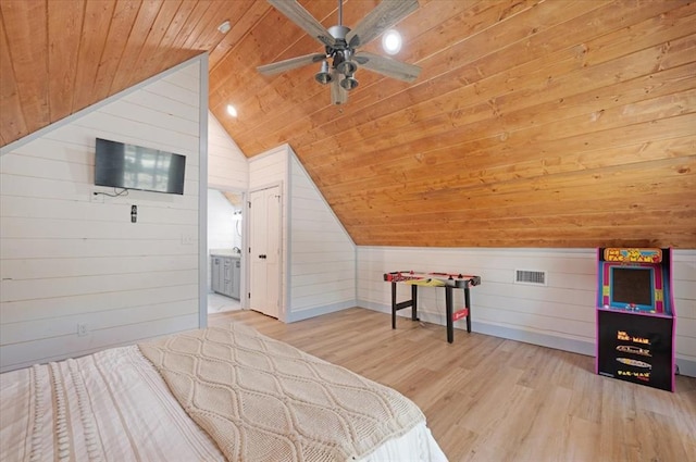 203 Secluded Cir, Broken Bow, OK 74728 - bedroom with wood ceiling, wood walls, lofted ceiling, wood finished floors, and connected bathroom