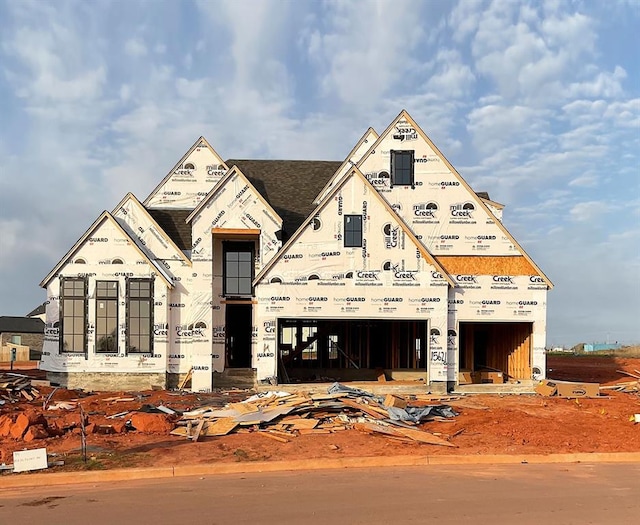 property under construction with an attached garage