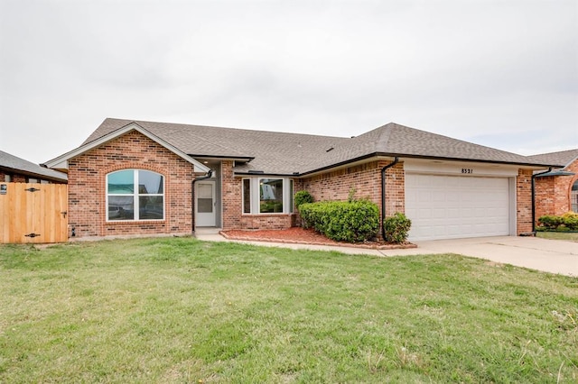 single story home featuring brick siding, roof with shingles, concrete driveway, and a garage