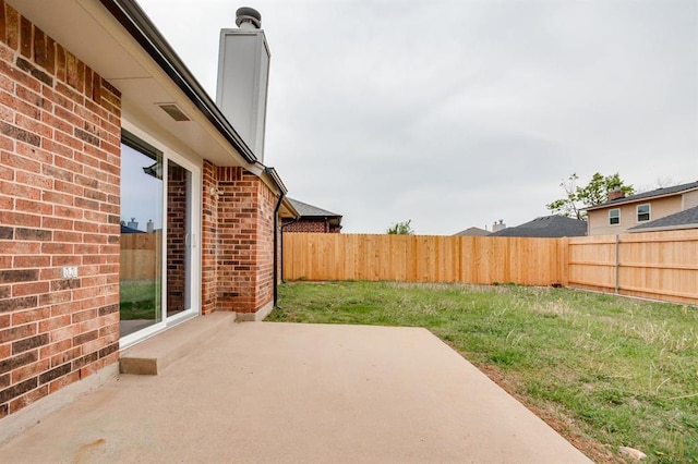 view of patio featuring a fenced backyard