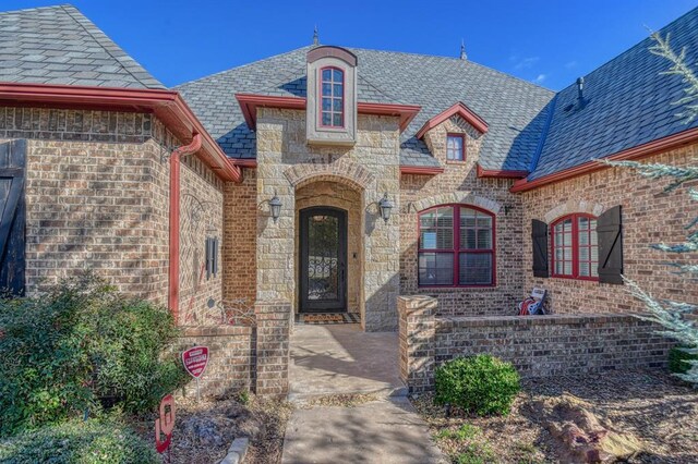 393 Haloka Ave, Washington, OK 73093 - view of exterior entry featuring brick siding