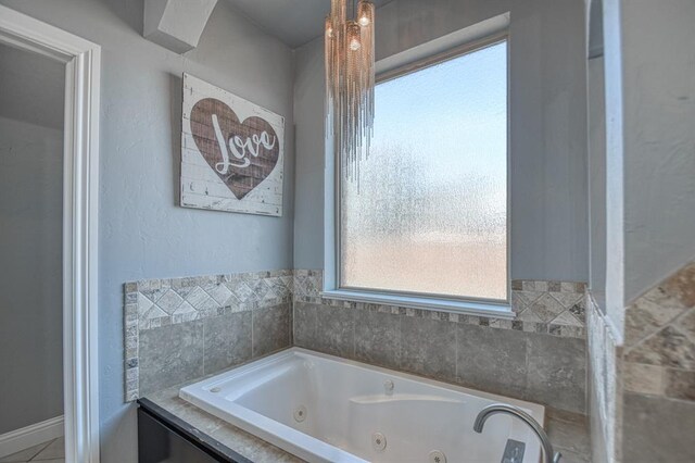 393 Haloka Ave, Washington, OK 73093 - bathroom featuring a jetted tub