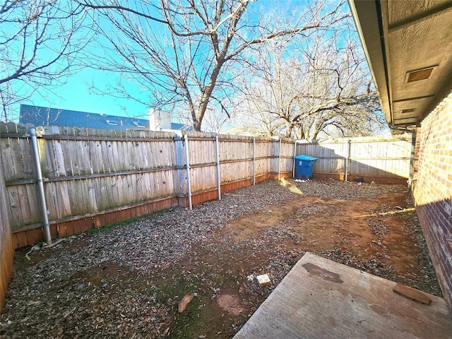 view of yard featuring a fenced backyard