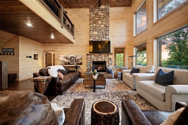 357 Little Creek Ln, Broken Bow, OK 74728 - living area with plenty of natural light, wooden ceiling, wood walls, and wood finished floors