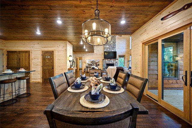 357 Little Creek Ln, Broken Bow, OK 74728 - dining area with wood walls, wood ceiling, and dark wood finished floors