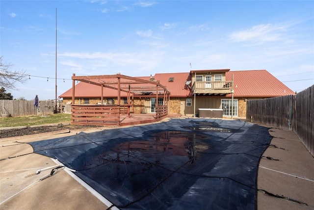 view of pool featuring a fenced backyard, a deck, and a fenced in pool