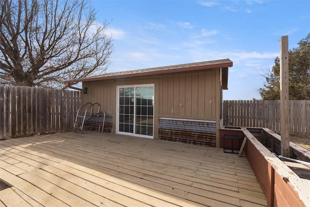 wooden deck featuring fence