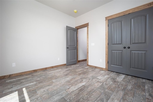 1430 County St Unit 2977, Blanchard, OK 73010 - unfurnished bedroom with wood finished floors and a closet
