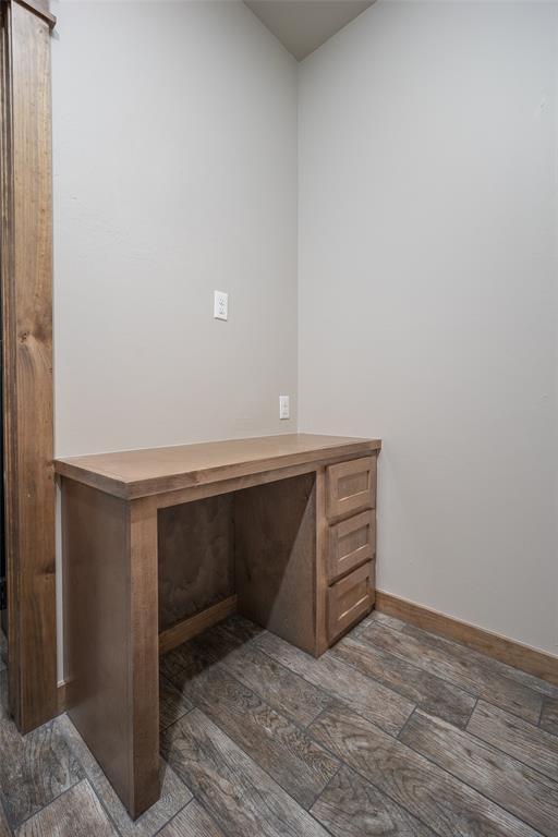 1430 County St Unit 2977, Blanchard, OK 73010 - unfurnished office with dark wood finished floors and baseboards