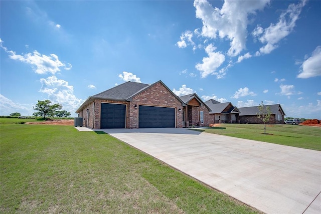 1430 County St Unit 2977, Blanchard, OK 73010 - ranch-style house featuring a garage, a front yard, brick siding, and concrete driveway