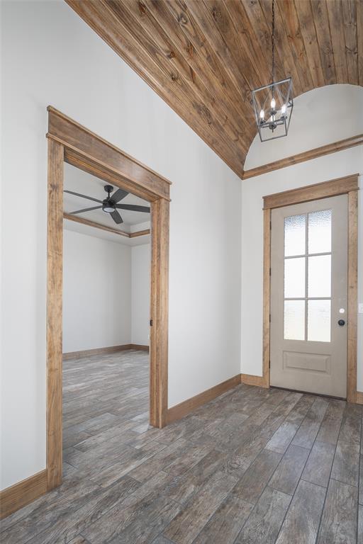 1430 County St Unit 2977, Blanchard, OK 73010 - entryway featuring vaulted ceiling, wood finished floors, a chandelier, wooden ceiling, and ornamental molding