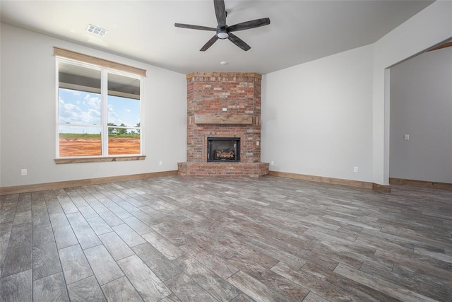 1430 County St Unit 2977, Blanchard, OK 73010 - unfurnished living room with ceiling fan, wood finished floors, and a fireplace