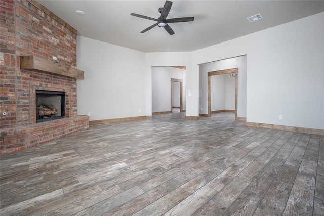 1430 County St Unit 2977, Blanchard, OK 73010 - unfurnished living room with a ceiling fan, wood finished floors, and a fireplace