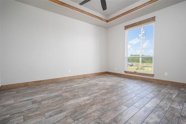 1430 County St Unit 2977, Blanchard, OK 73010 - unfurnished room with wood finish floors, a ceiling fan, and a tray ceiling
