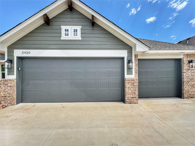 2420 Northfork Dr, Moore, OK 73160 - garage featuring driveway