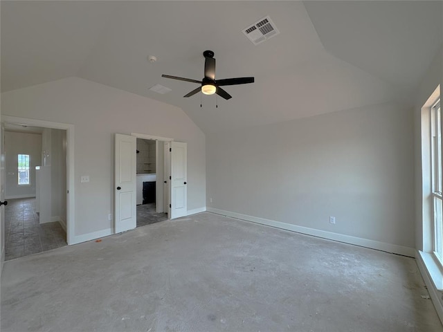 2420 Northfork Dr, Moore, OK 73160 - unfurnished bedroom featuring lofted ceiling, baseboards, and a ceiling fan