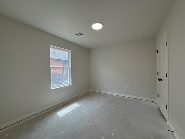 2420 Northfork Dr, Moore, OK 73160 - spare room with unfinished concrete flooring and baseboards