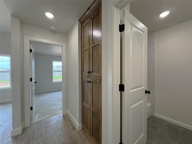 2420 Northfork Dr, Moore, OK 73160 - hallway featuring healthy amount of natural light, baseboards, and recessed lighting