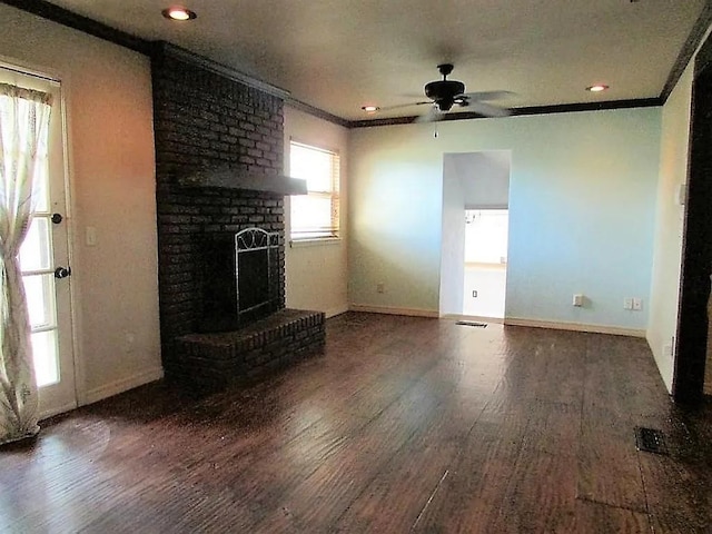 4700 NW 59th Ter, Oklahoma City, OK 73122 - unfurnished living room with a brick fireplace, crown molding, ceiling fan, and wood finished floors