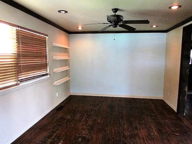 4700 NW 59th Ter, Oklahoma City, OK 73122 - spare room featuring baseboards, ceiling fan, wood finished floors, and ornamental molding