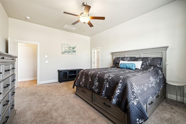 bedroom featuring visible vents, baseboards, light colored carpet, and ceiling fan