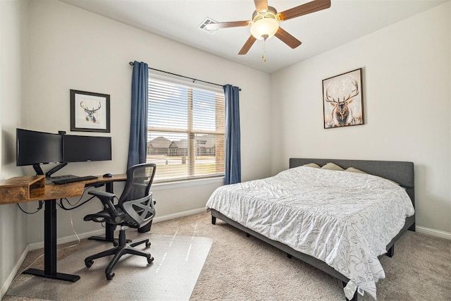 bedroom featuring baseboards, visible vents, ceiling fan, and carpet