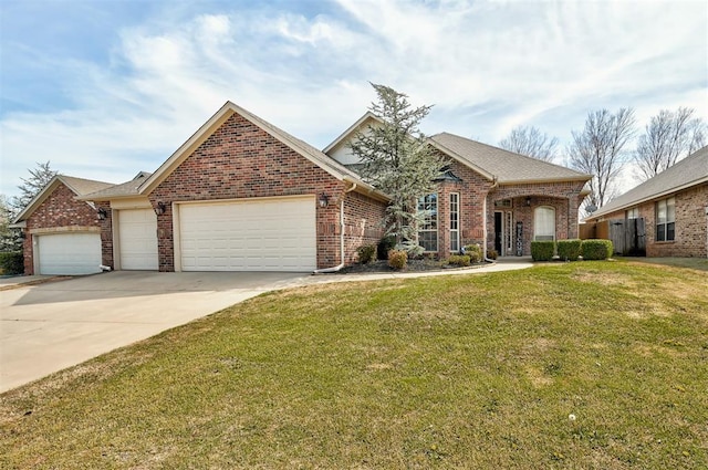 view of front of property with a front lawn, a garage, brick siding, and concrete driveway