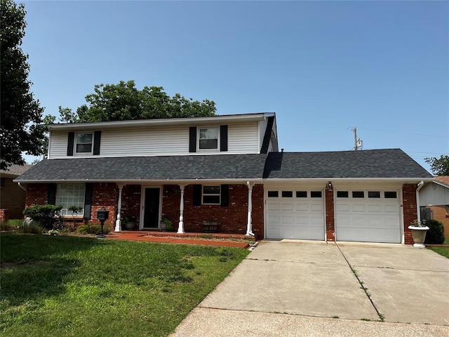 7205 N Seminole Ter, Warr Acres, OK 73132 - traditional home with a garage, brick siding, a front yard, and driveway