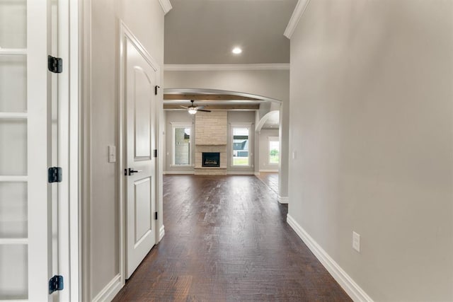 4174 Richards Way, Piedmont, OK 73078 - corridor featuring crown molding, arched walkways, dark wood-type flooring, and recessed lighting