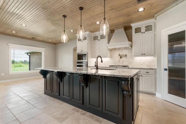 4174 Richards Way, Piedmont, OK 73078 - kitchen with custom exhaust hood, wood ceiling, stainless steel appliances, white cabinets, and decorative backsplash