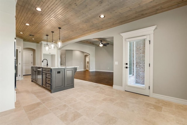 4174 Richards Way, Piedmont, OK 73078 - kitchen with arched walkways, a ceiling fan, wood ceiling, open floor plan, and pendant lighting