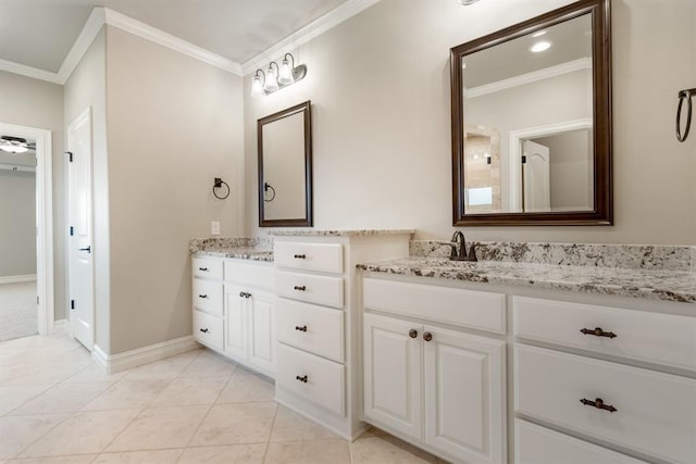 4174 Richards Way, Piedmont, OK 73078 - bathroom with crown molding, two vanities, and tile patterned flooring
