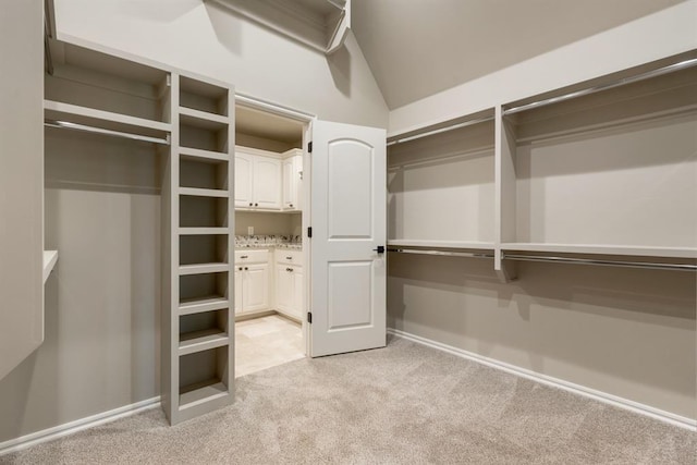 4174 Richards Way, Piedmont, OK 73078 - walk in closet with light colored carpet and lofted ceiling