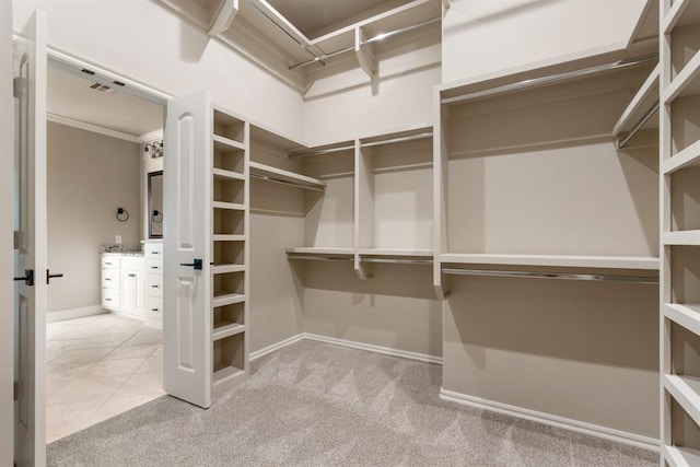 4174 Richards Way, Piedmont, OK 73078 - walk in closet with carpet flooring