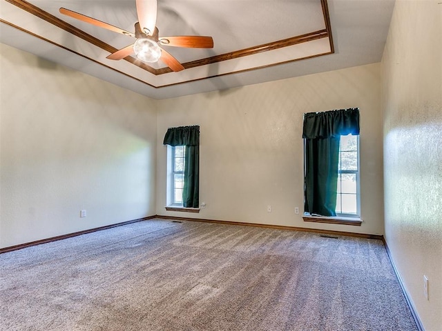 407 Heather Ln, Tuttle, OK 73089 - unfurnished room featuring carpet flooring, a ceiling fan, baseboards, and a raised ceiling