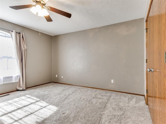407 Heather Ln, Tuttle, OK 73089 - carpeted empty room with ceiling fan and baseboards