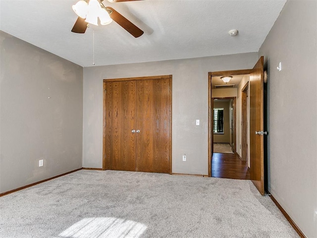 407 Heather Ln, Tuttle, OK 73089 - unfurnished bedroom with carpet floors, baseboards, and a closet