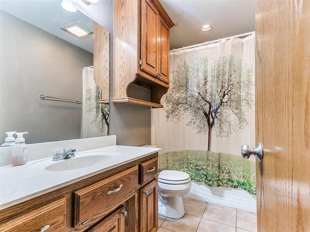 407 Heather Ln, Tuttle, OK 73089 - bathroom with tile patterned flooring, toilet, vanity, and curtained shower
