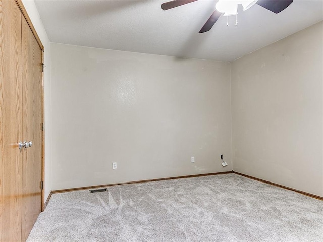 407 Heather Ln, Tuttle, OK 73089 - carpeted spare room featuring a ceiling fan and baseboards