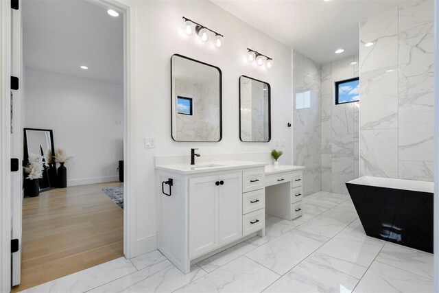 2109 Wiregrass Rd, Edmond, OK 73025 - full bathroom with vanity, marble finish floors, a marble finish shower, and recessed lighting